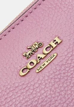 Coach SMALL WRISTLET - Other Accessories - Tulip -Coach Shop 04bc30c9d6b5452a869ca1f784217334