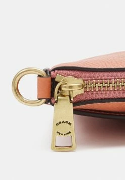 Coach POLISHED PEBBLE CROSSBODY - Clutch - Light Coral -Coach Shop 0653714eea2b4804ac1e4edb860baa67