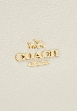Coach POLISHED PEBBLED SCOUT - Handbag - Chalk -Coach Shop 169e65140ec44fdc9aefdd5c9b09aeca