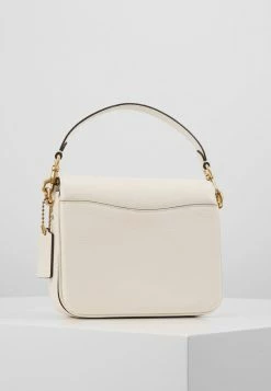 Coach POLISHED PEBBLED CASSIE CROSSBODY - Handbag - Chalk -Coach Shop 2480a339fa8a4e8ab4536543725d52af