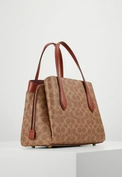 Coach SIGNATURE LORA CARRYALL - Handbag - Tan Rust -Coach Shop 2a2d5acb9bc74b488338a4509ab31b02