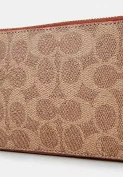 Coach COLORBLOCK COATED SIGNATURE KIRA CROSSBODY - Across Body Bag - Tan Rust 9 Coach COLORBLOCK COATED SIGNATURE KIRA CROSSBODY - Across Body Bag - Tan Rust -Coach Shop 2b085bc4b0fd443398b986ac71e08b10