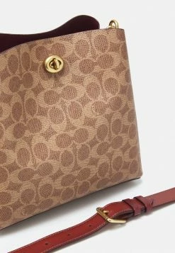 Coach POLISHED WILLOW BUCKET BAG - Handbag - Tan/rust -Coach Shop 2b1a99fd62fe44199bbf9b384e154324