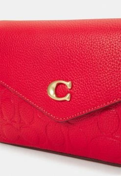 Coach SIGNATURE CROSSBODY - Across Body Bag - Sport Red -Coach Shop 2e41ec8392ac41969b9fdac4927bf4f9