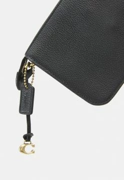 Coach PEBBLED LEATHER NOA - Across Body Bag - Black -Coach Shop 409f5ff8cba84fb28db0658d31765c45