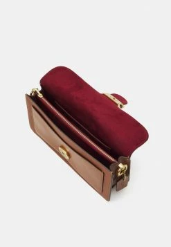 Coach POLISHED TABBY SHOULDER BAG - Handbag - Saddle -Coach Shop 47b3ac8a36ec432b9f10ec95db10e080