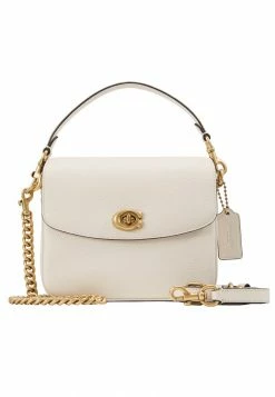 Coach POLISHED PEBBLED CASSIE CROSSBODY - Handbag - Chalk -Coach Shop 4ad62449fa9d462d8d1d402199806985