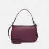 Coach SOFT PEBBLE - Across Body Bag - Deep Berry