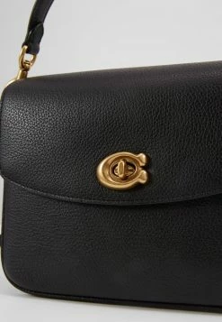 Coach POLISHED PEBBLED CASSIE CROSSBODY - Handbag - Black -Coach Shop 5bcdd65ddf2547cdab3f280eaba4d2f4