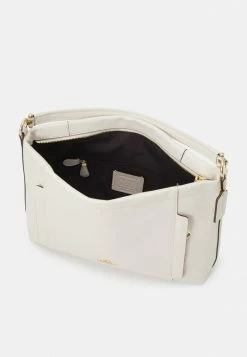 Coach POLISHED PEBBLED SCOUT - Handbag - Chalk -Coach Shop 626d9d1bc3644f40a6293f23eeaebfaa