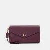 Coach CROSSGRAIN WRISTLET - Clutch - Deep Berry