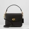 Coach POLISHED PEBBLED CASSIE CROSSBODY - Handbag - Black