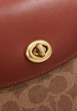 Coach COATED SIGNATURE CASSIE CROSSBODY - Handbag - Tan Rust 11 Coach COATED SIGNATURE CASSIE CROSSBODY - Handbag - Tan Rust -Coach Shop 87ff9adbddc3407aa3c4cbca8d3a444f