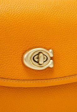 Coach POLISHED PEBBLE WILLOW SADDLE - Across Body Bag - Papaya -Coach Shop 8c7a4eec9187481a89a2092306ff953b