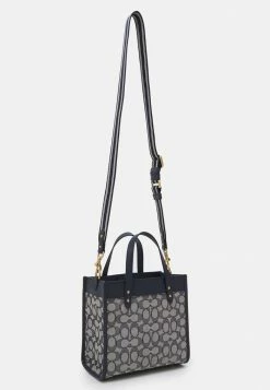 Coach COLORBLOCK BADGE FIELD TOTE CROSSBODY - Handbag - Midnight Navy -Coach Shop 925903f9fe574ca9b48533bb92408285
