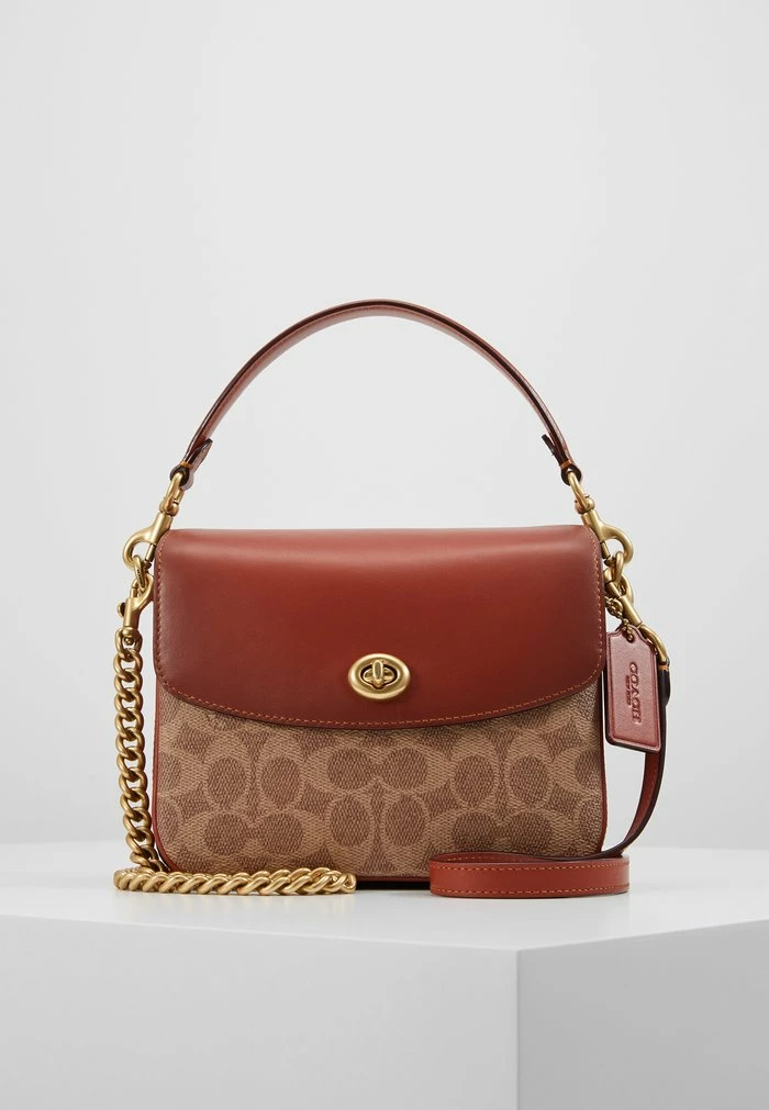 Coach COATED SIGNATURE CASSIE CROSSBODY - Handbag - Tan Rust 1 Coach COATED SIGNATURE CASSIE CROSSBODY - Handbag - Tan Rust