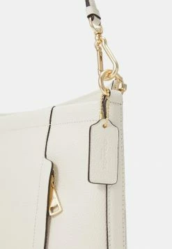 Coach POLISHED PEBBLED SCOUT - Handbag - Chalk -Coach Shop a2df04ce00424c7bab10bde78008635e