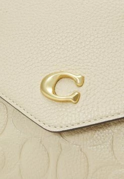 Coach SIGNATURE CROSSBODY - Across Body Bag - Ivory -Coach Shop a66da416a1c045c3bba2833ee0665aea