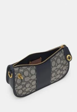Coach SIGNATURE SWINGER - Handbag - Navy Midnight Navy -Coach Shop aaf6c865a2a743109818ee29b9253863