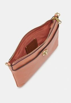 Coach POLISHED PEBBLE CROSSBODY - Clutch - Light Coral -Coach Shop b235596fb53647ae9b7e5019b504f594