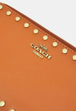 Coach SMOOTH WITH RIVETS KIRA CROSSBODY - Across Body Bag - Canyon -Coach Shop c6da48c9c9254e8db163105c244231cc