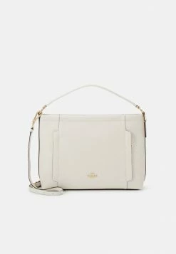 Coach POLISHED PEBBLED SCOUT - Handbag - Chalk
