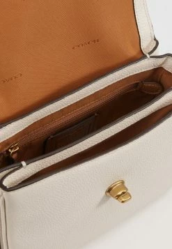 Coach POLISHED PEBBLED CASSIE CROSSBODY - Handbag - Chalk -Coach Shop d18b6603b2e841cc83cf85f27d642ed1