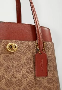 Coach SIGNATURE LORA CARRYALL - Handbag - Tan Rust -Coach Shop d1d4e514d58942e084771edbfcac5a37