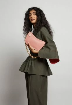 Coach ORIGINALS SWINGER WITH CHAIN - Handbag - Candy Pink