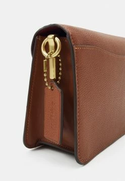 Coach POLISHED TABBY SHOULDER BAG - Handbag - Saddle -Coach Shop d84021d2dd6b46bcade1b0dcd13ba12c