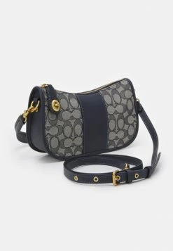 Coach SIGNATURE SWINGER - Handbag - Navy Midnight Navy -Coach Shop dc1d5e648f7b44f4bd8f9036c23a8141
