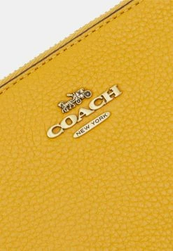 Coach POLISHED SMALL WRISTLET - Clutch - Buttercup 9 Coach POLISHED SMALL WRISTLET - Clutch - Buttercup -Coach Shop df8eee2a29fe4c6d80df19013b9e7a5b