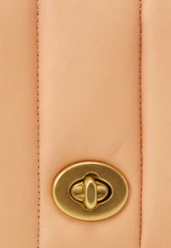 Coach ORIGINALS PUFFY QUILTED DINKY CROSSBODY - Across Body Bag - Faded Blush -Coach Shop e7a36a6ece7f41bf9f06db22b800dceb