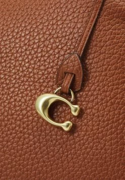 Coach CARY SHOULDER BAG - Handbag - Saddle 11 Coach CARY SHOULDER BAG - Handbag - Saddle -Coach Shop ef6a2c83ef974932b721eaf8d493016a