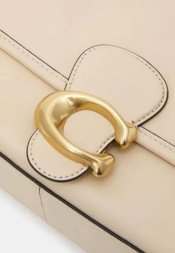 Coach SOFT TABBY SHOULDER BAG - Handbag - Ivory -Coach Shop f716495a1fe84c4ba12064ad2c292d4f